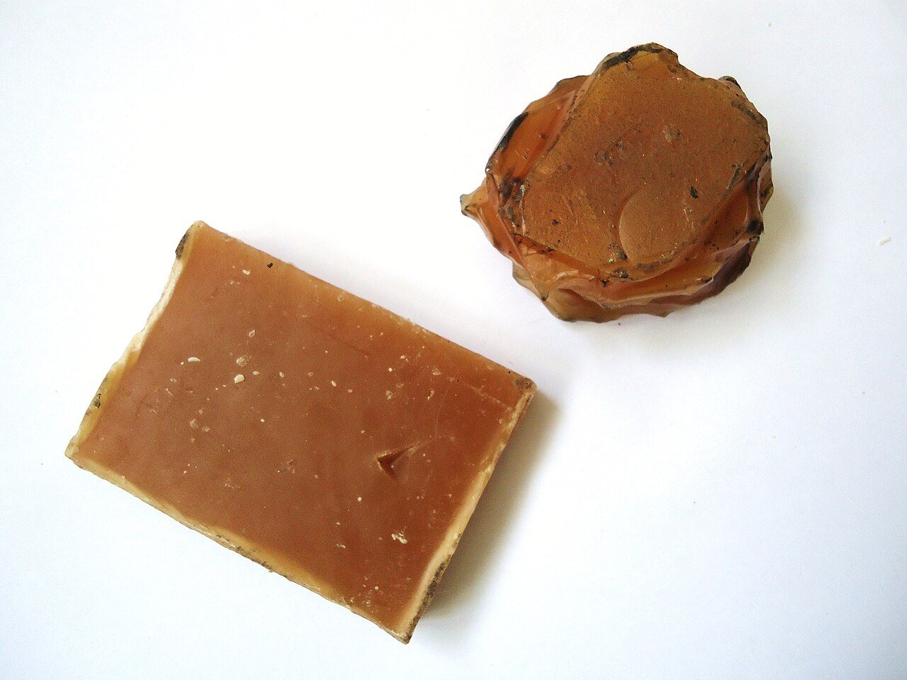 Dark yellow beeswax blocks cast in moulds