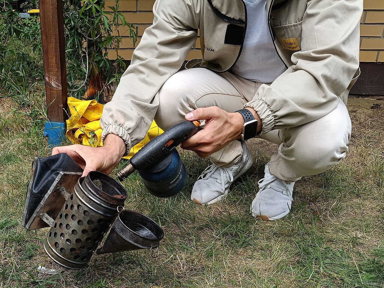 Lighting smoker fuel with a gas torch