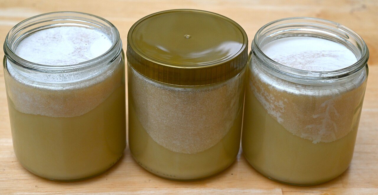 Jars of low-moisture crystallised honey