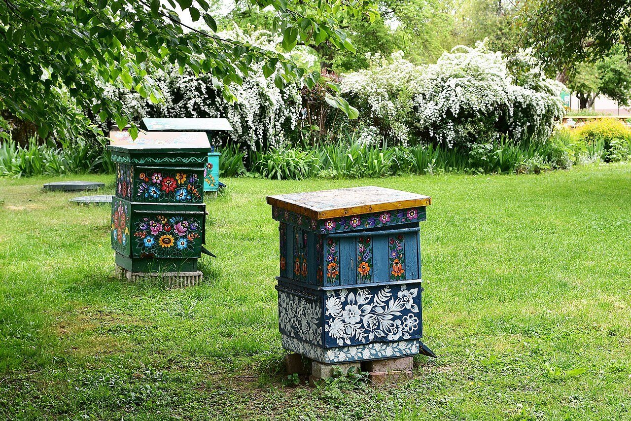 Traditional hives painted with flower patterns
